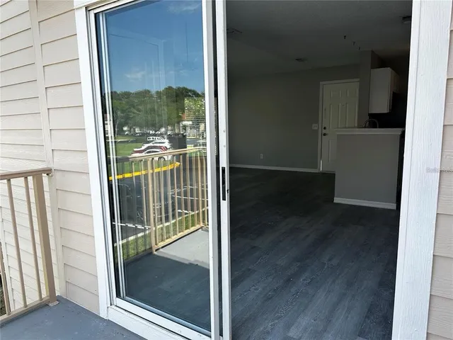 a view of a two chairs on the deck