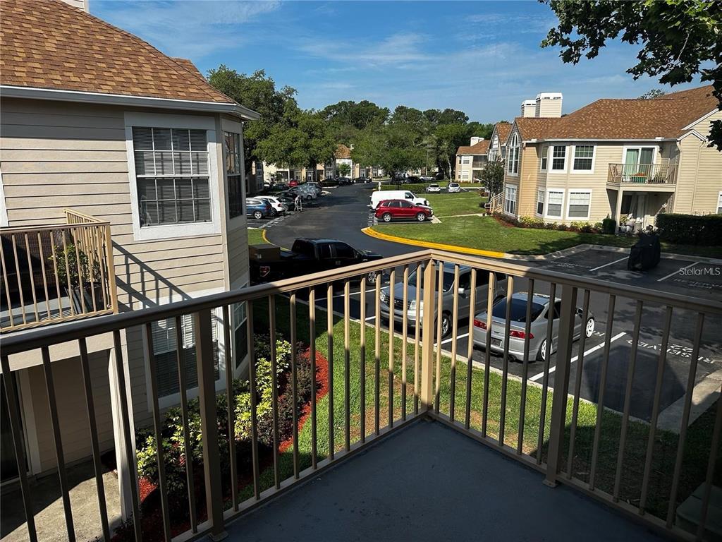 652 Roaring Drive, Unit 234 Altamonte Springs, FL 32714 - Photo 36 of 39 a view of a house with wooden deck
