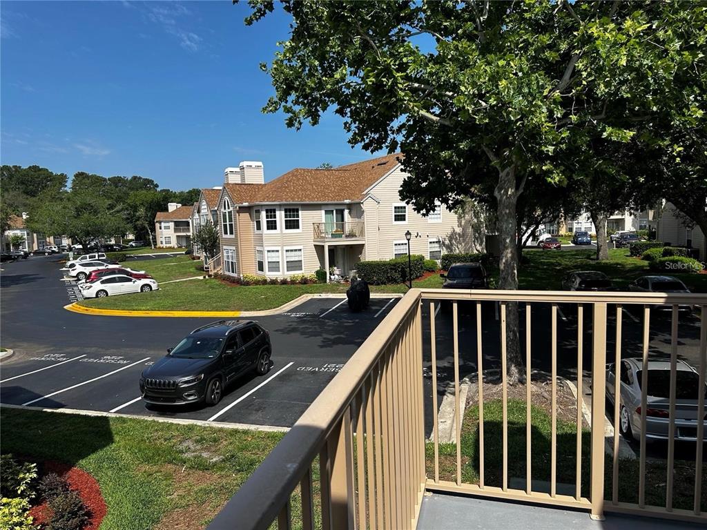 652 Roaring Drive, Unit 234 Altamonte Springs, FL 32714 - Photo 37 of 39 a view of a two chairs on the deck