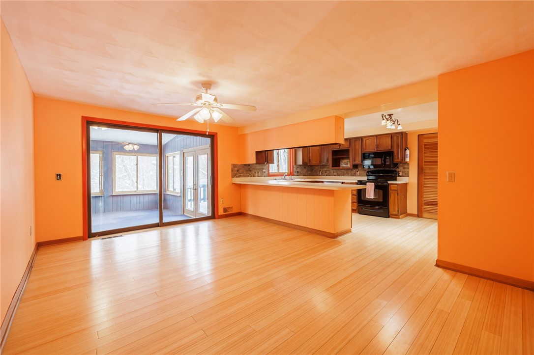 237 Hollybrook Road Sweden, NY 14420 - Photo 13 of 39 Dining Room with Sliding Glass Door to the Enclose