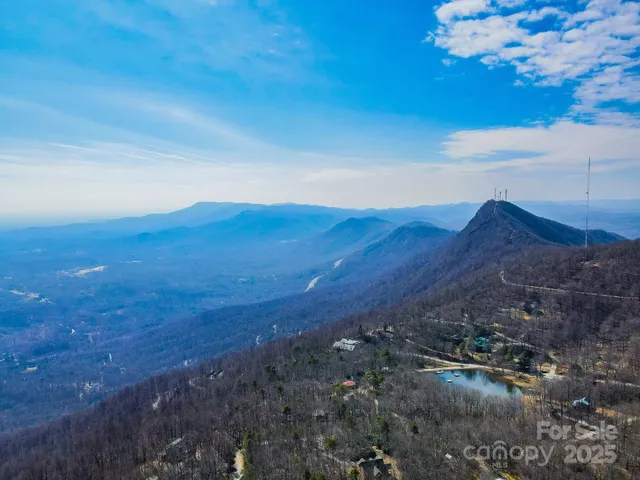a view of ocean and mountains