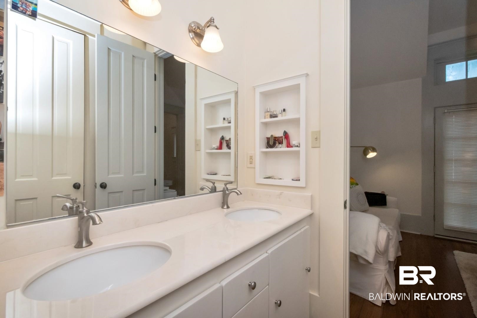 4810 Mums Court Mobile, AL 36608 - Photo 19 of 50 Bathroom with double vanity, ensuite bath, and dark wood-style flooring