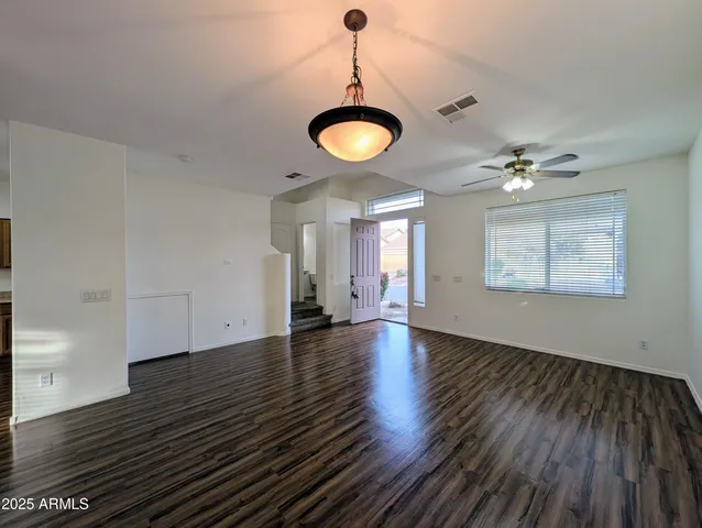 a view of a kitchen with a sink and a stove top oven