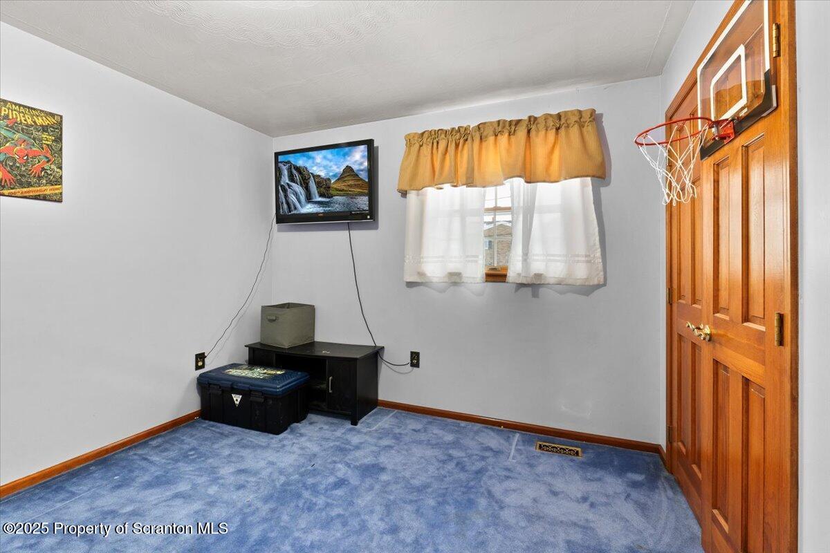 211 New Street Duryea, PA 18642 - Photo 17 of 32 a room with a bed and a window