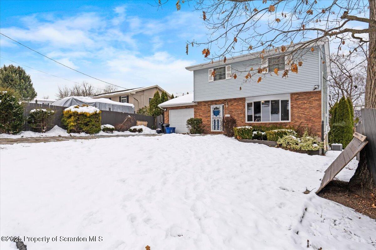 211 New Street Duryea, PA 18642 - Photo 2 of 32 a street view with residential house