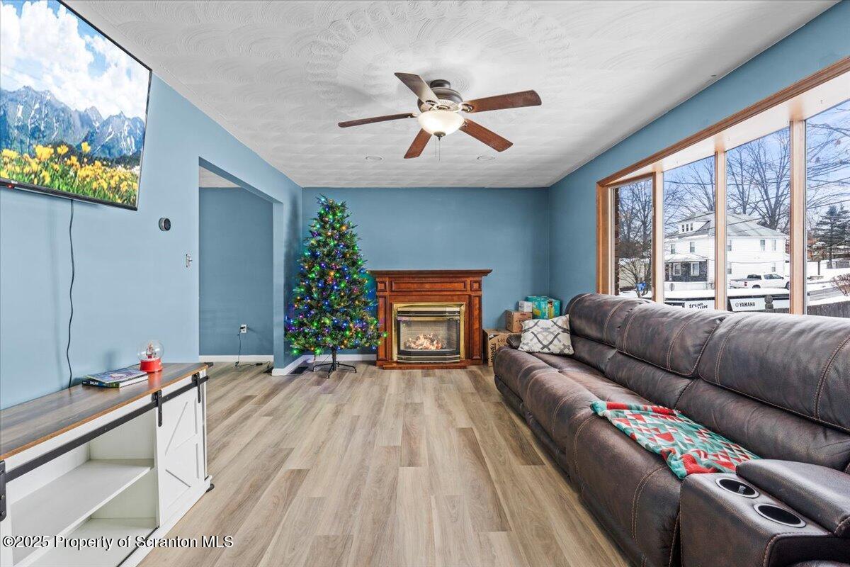 211 New Street Duryea, PA 18642 - Photo 3 of 32 a living room with furniture and a large window