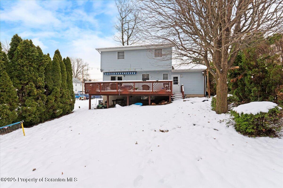 211 New Street Duryea, PA 18642 - Photo 31 of 32 a view of a house with a snow in the yard
