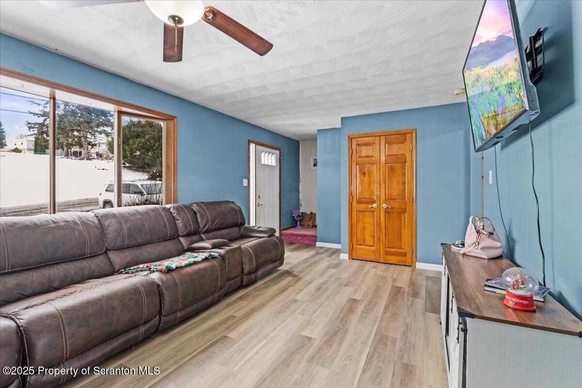 211 New Street Duryea, PA 18642 - Photo 4 of 32 a living room with furniture and a window