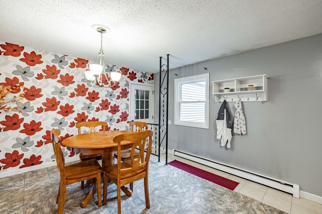 83 Mallowhill Road Springfield, MA 01129 - Photo 12 of 38 a dining room with furniture and window