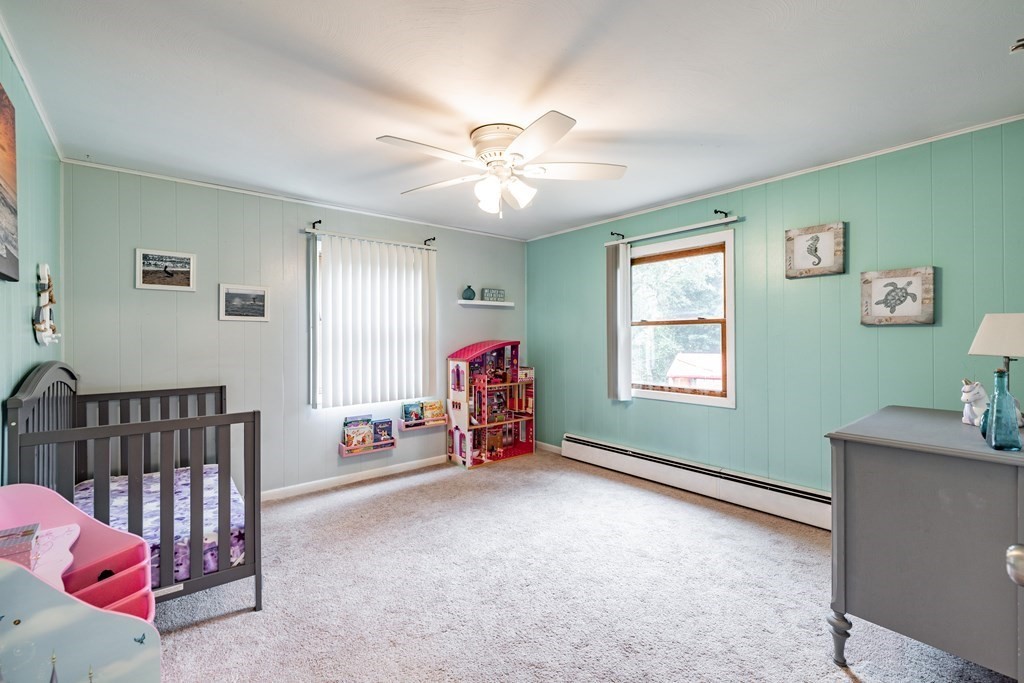 83 Mallowhill Road Springfield, MA 01129 - Photo 23 of 38 a view of a livingroom with window and a couch