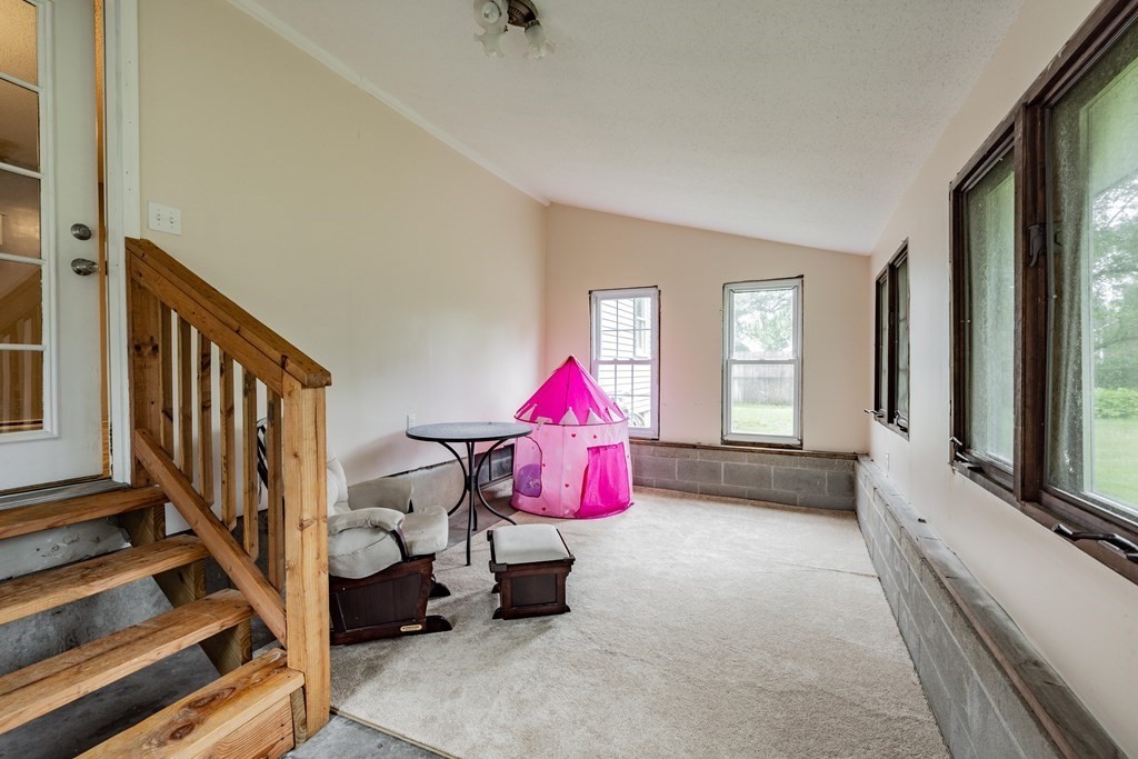 83 Mallowhill Road Springfield, MA 01129 - Photo 28 of 38 a room with toys and flat screen tv