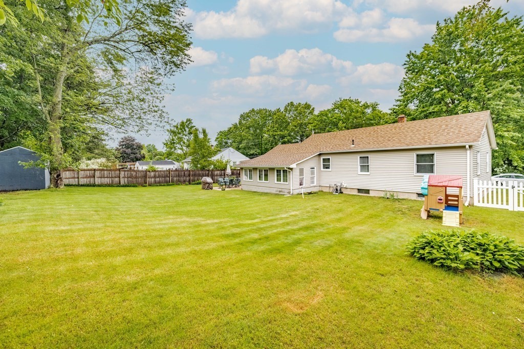 83 Mallowhill Road Springfield, MA 01129 - Photo 35 of 38 a swimming pool with lawn chairs and plants