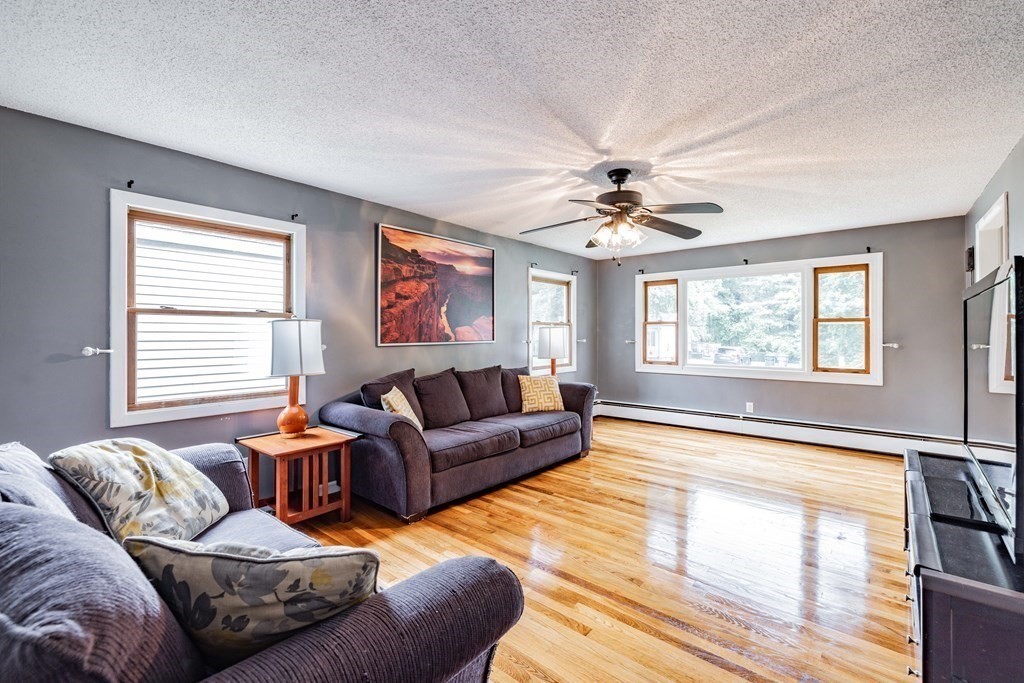 83 Mallowhill Road Springfield, MA 01129 - Photo 5 of 38 a living room with furniture and a large window