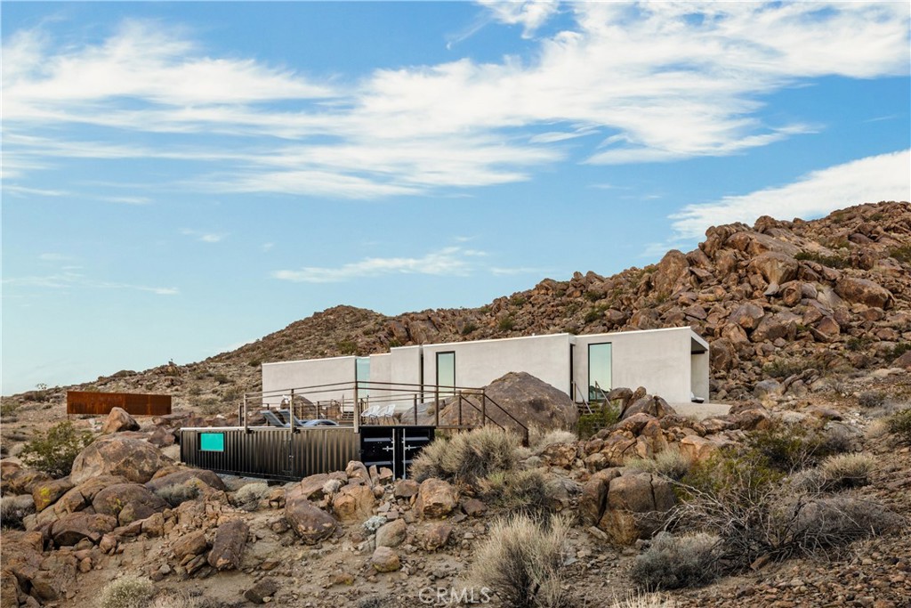 1824 Mountain Shadow Road Joshua Tree, CA 92252 - Photo 27 of 39 a view of a terrace with a garden