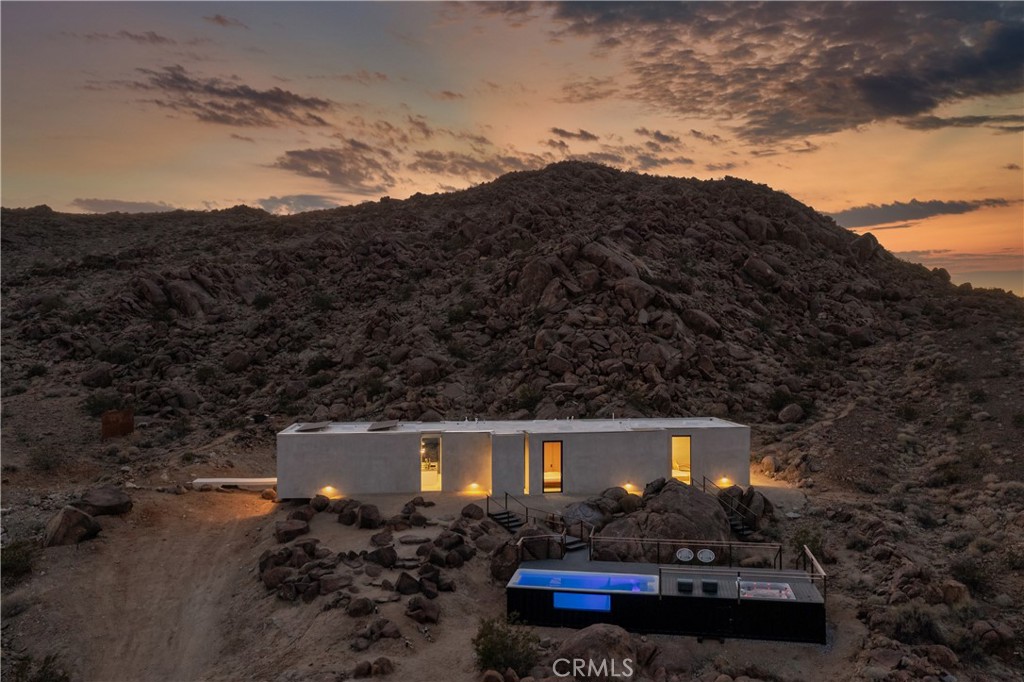 1824 Mountain Shadow Road Joshua Tree, CA 92252 - Photo 4 of 39 a front view of house with a yard