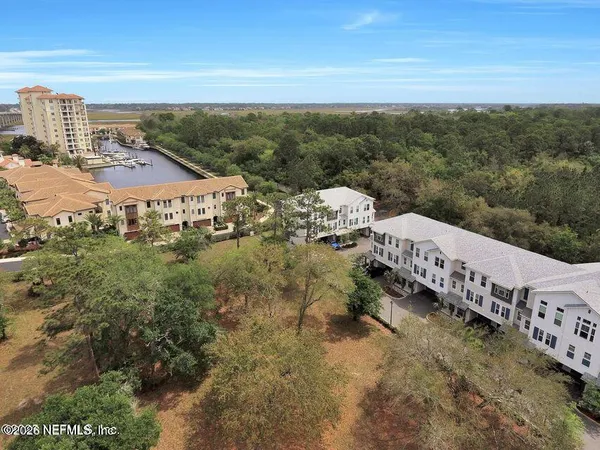 a view of a city with an ocean view