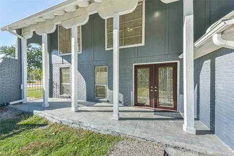 a front view of a house with a porch