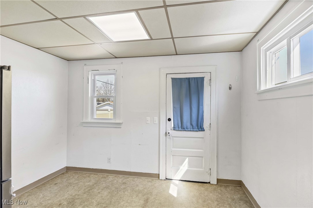 7700 Spring Garden Road Cleveland, OH 44129 - Photo 22 of 50 Foyer with baseboards and a paneled ceiling