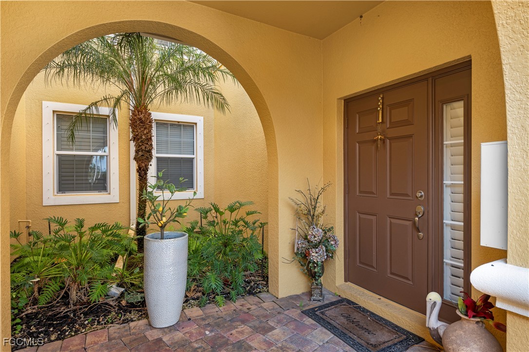 12930 New Market Street, Unit 202 Fort Myers, FL 33913 - Photo 2 of 30 a view of entrance door of house