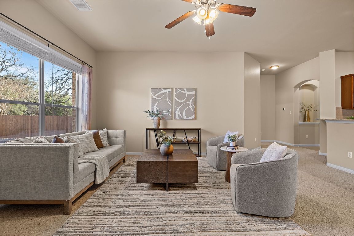 3948 Sapphire Loop Round Rock, TX 78681 - Photo 11 of 40 a living room with furniture and a large window