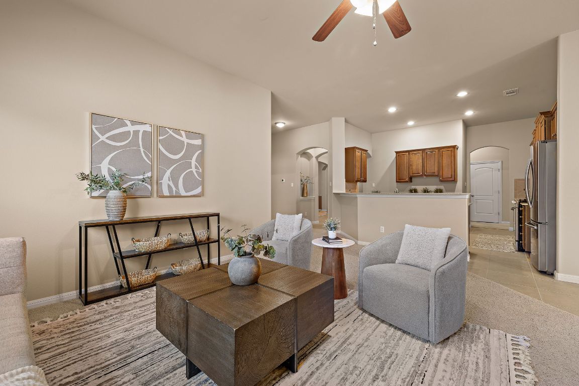 3948 Sapphire Loop Round Rock, TX 78681 - Photo 12 of 40 a living room with furniture and a wooden floor