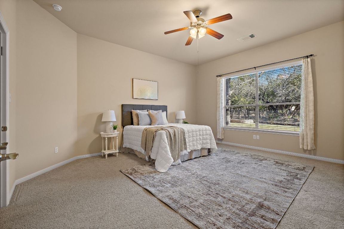 3948 Sapphire Loop Round Rock, TX 78681 - Photo 21 of 40 a bedroom with a bed and a window