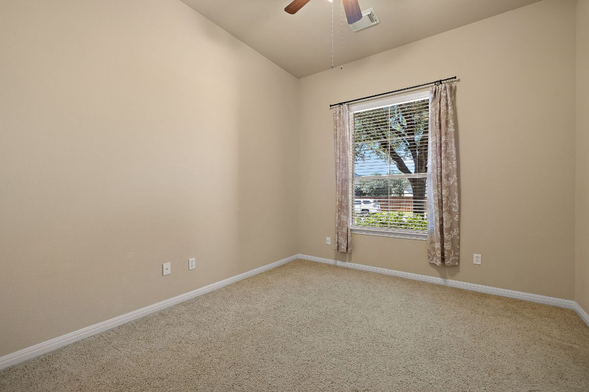 3948 Sapphire Loop Round Rock, TX 78681 - Photo 26 of 40 an empty room with windows