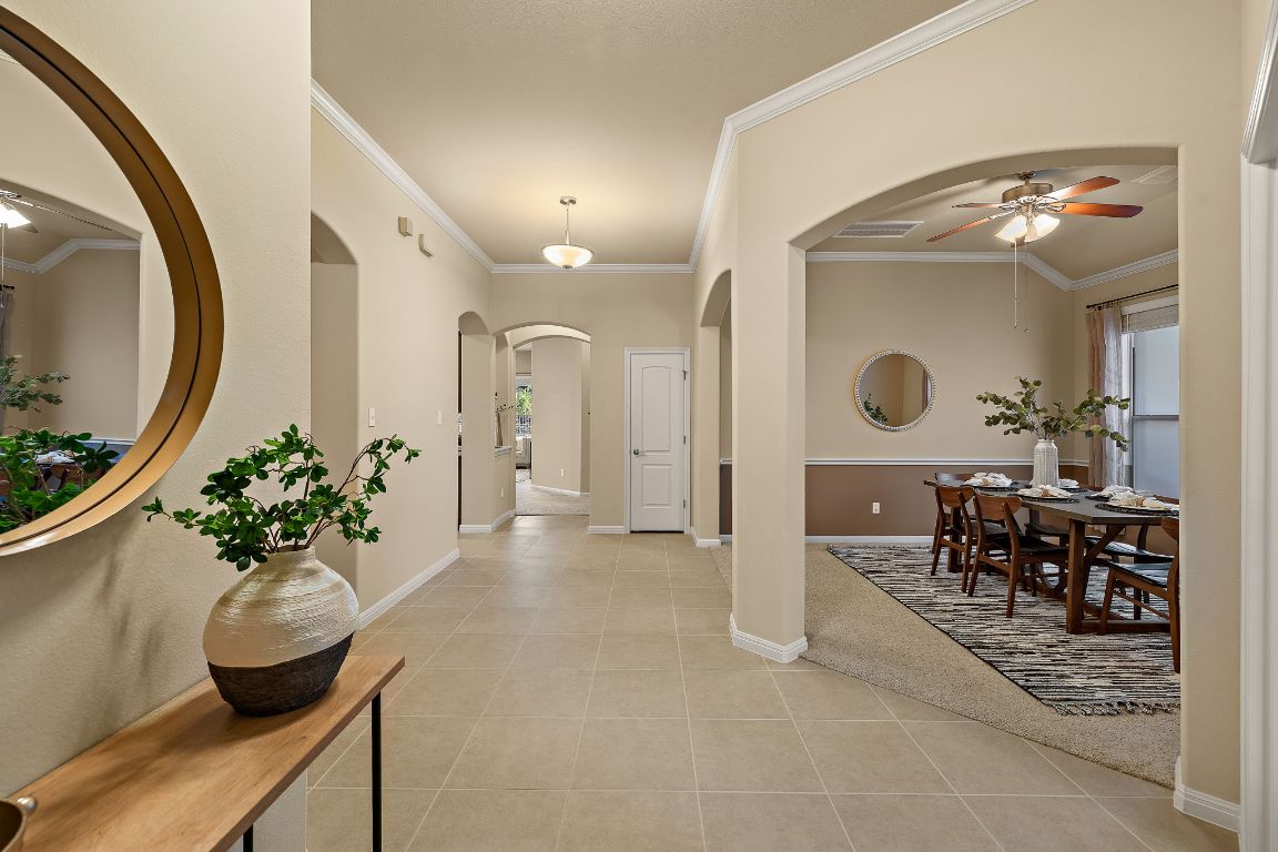 3948 Sapphire Loop Round Rock, TX 78681 - Photo 6 of 40 a view of a livingroom with furniture and a chandelier