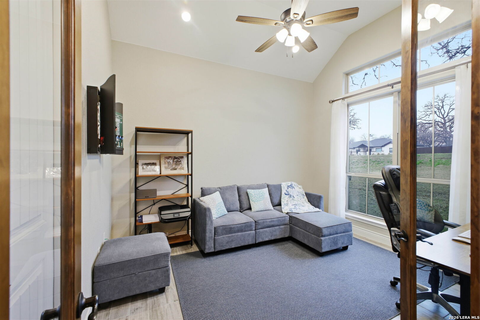 117 Crescent Ridge Adkins, TX 78101 - Photo 11 of 49 a living room with furniture and a flat screen tv