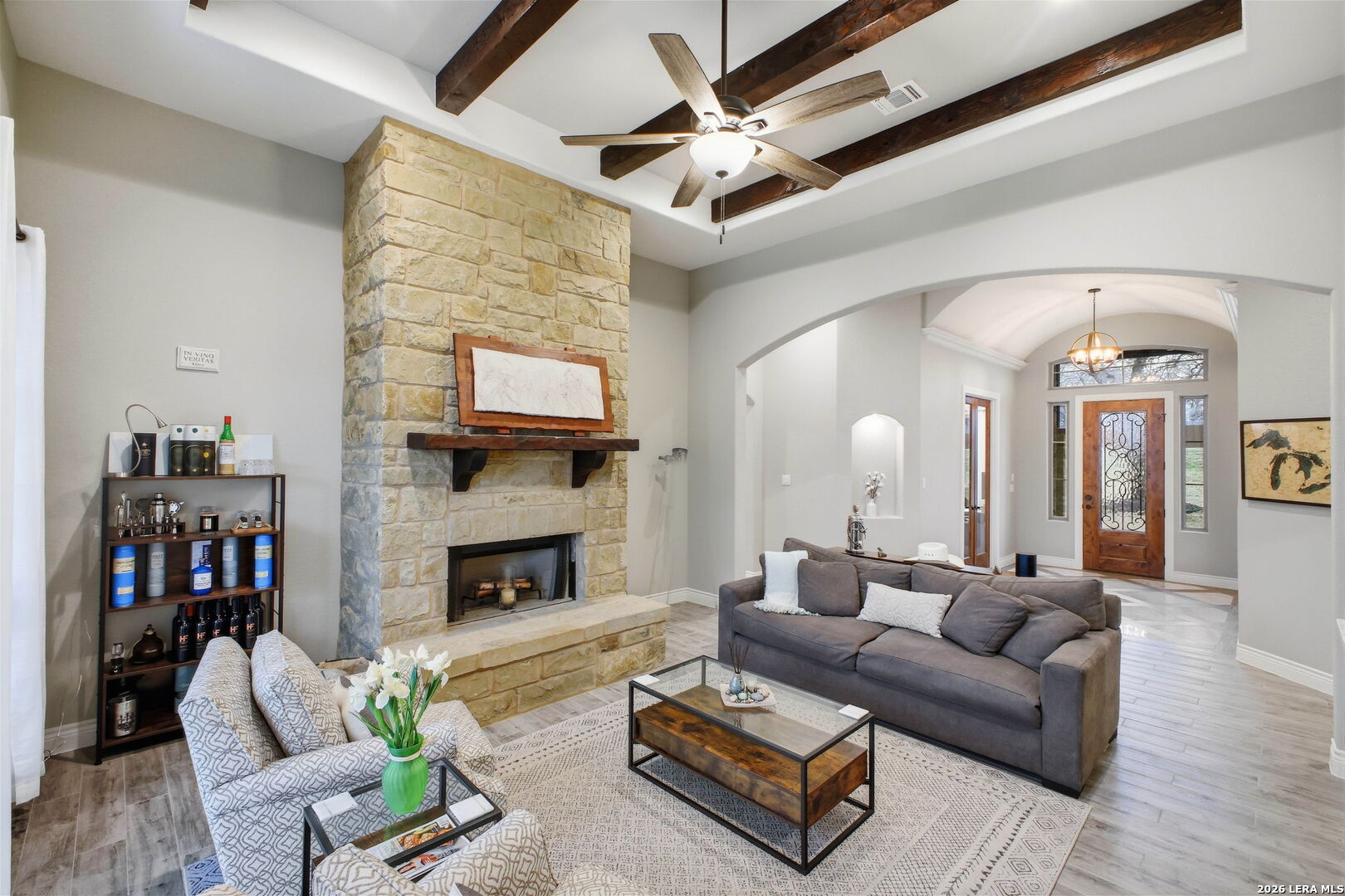 117 Crescent Ridge Adkins, TX 78101 - Photo 13 of 49 a living room with furniture a fireplace and a flat screen tv