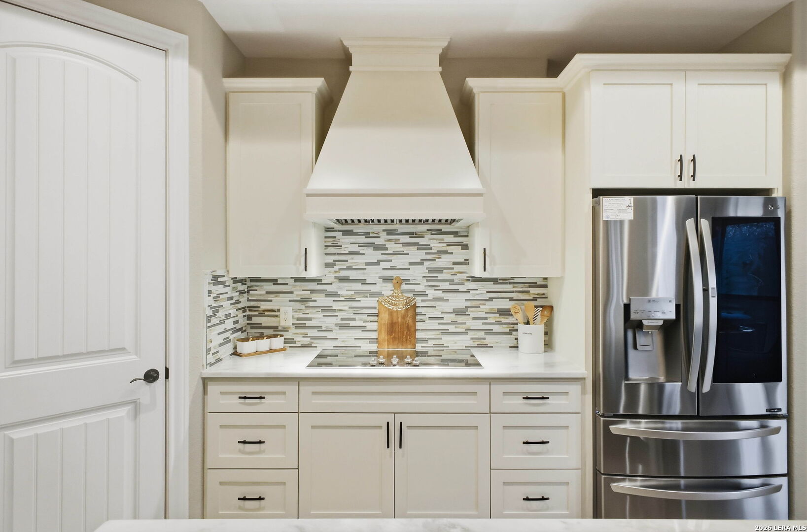 117 Crescent Ridge Adkins, TX 78101 - Photo 20 of 49 a kitchen with cabinets and stainless steel appliances