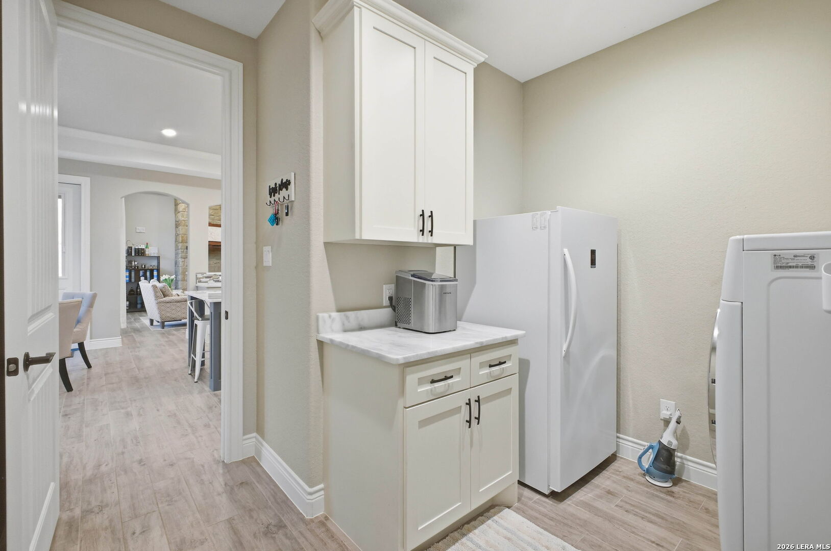 117 Crescent Ridge Adkins, TX 78101 - Photo 24 of 49 a room that has a washer and dryer