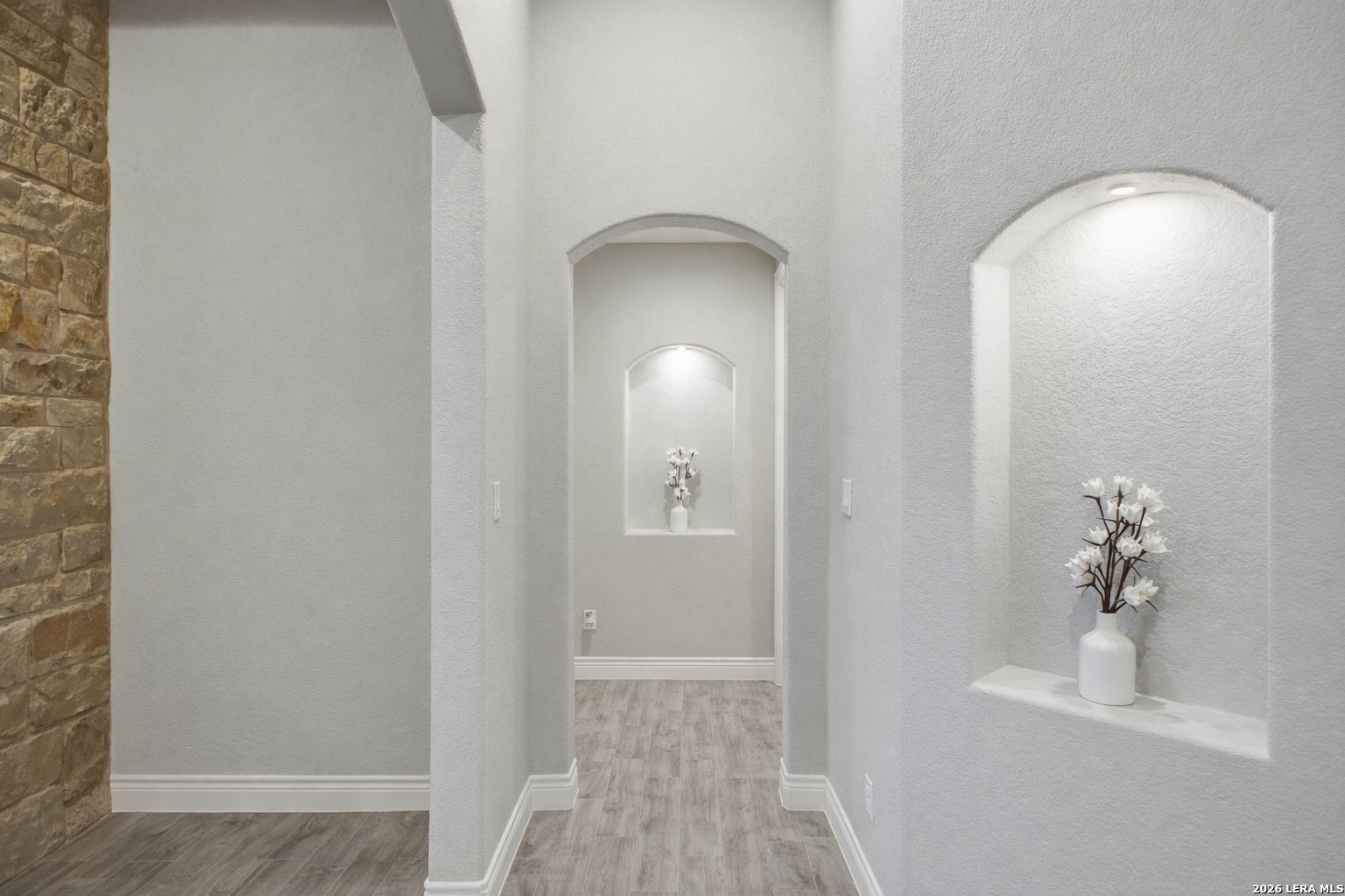 117 Crescent Ridge Adkins, TX 78101 - Photo 26 of 49 a view of a livingroom from a hallway