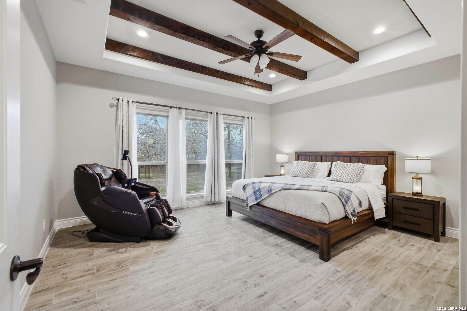 117 Crescent Ridge Adkins, TX 78101 - Photo 27 of 49 a spacious bedroom with a bed and glass window