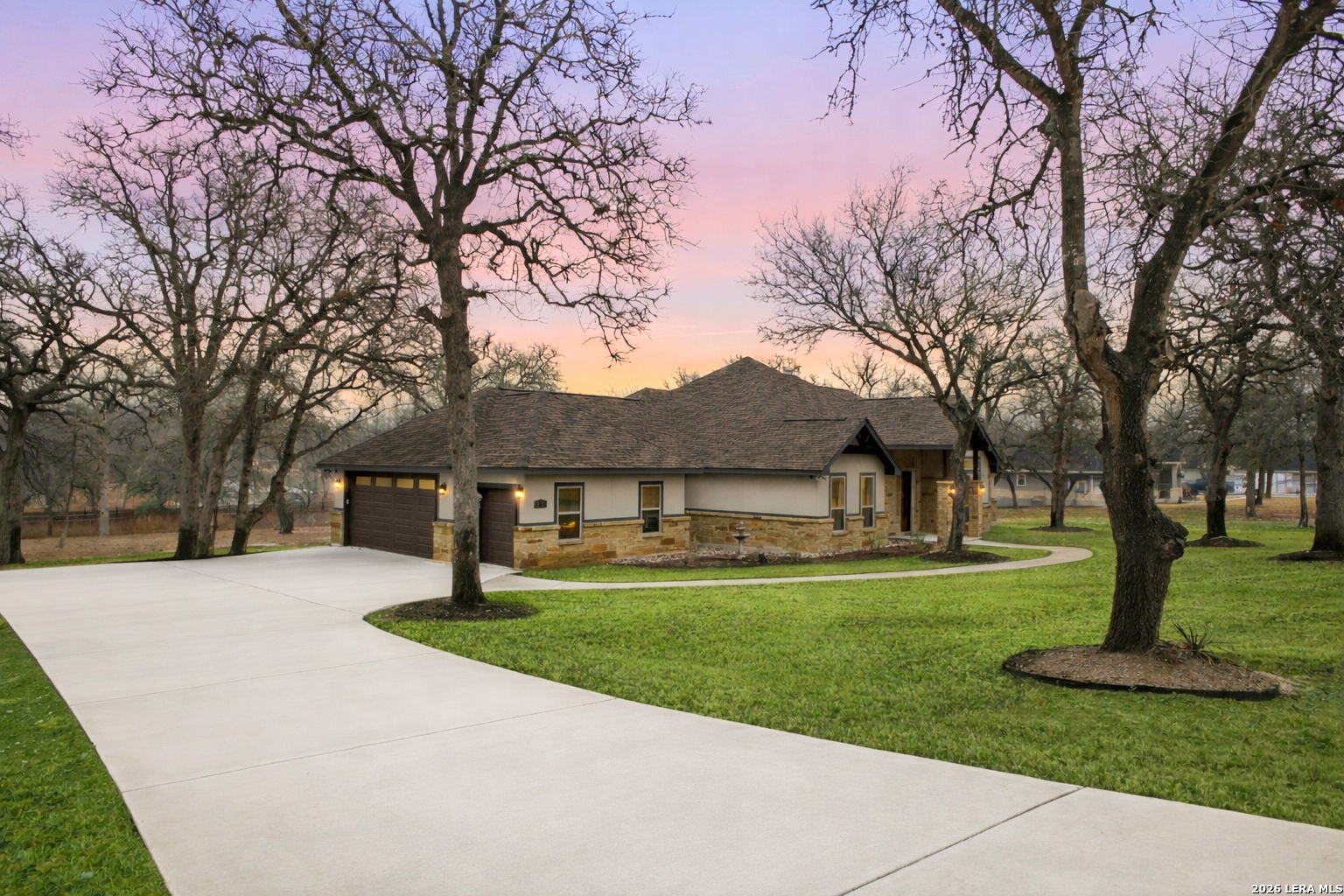 117 Crescent Ridge Adkins, TX 78101 - Photo 3 of 49 a front view of a house with garden