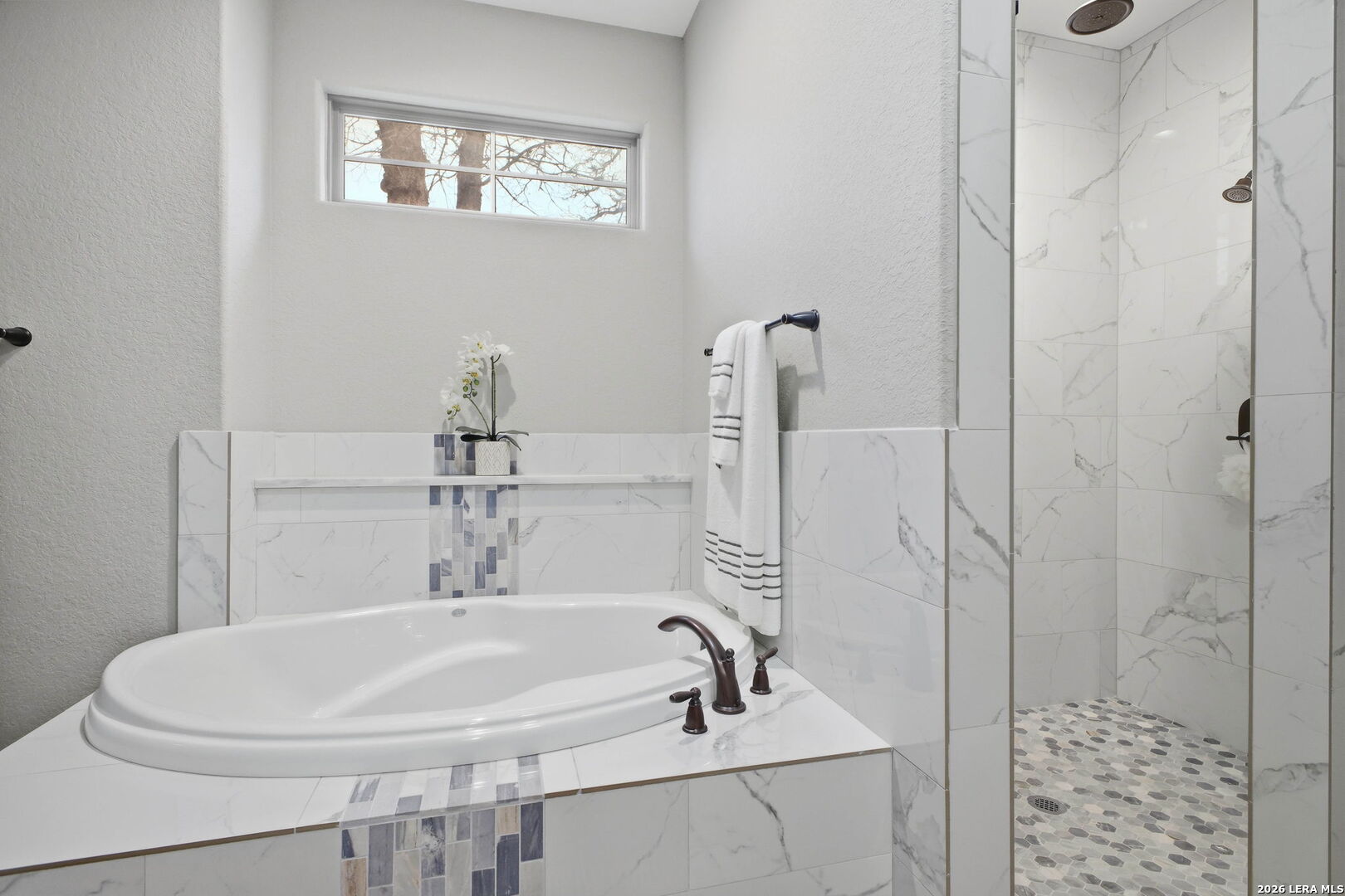 117 Crescent Ridge Adkins, TX 78101 - Photo 31 of 49 a bathroom with a sink and a mirror