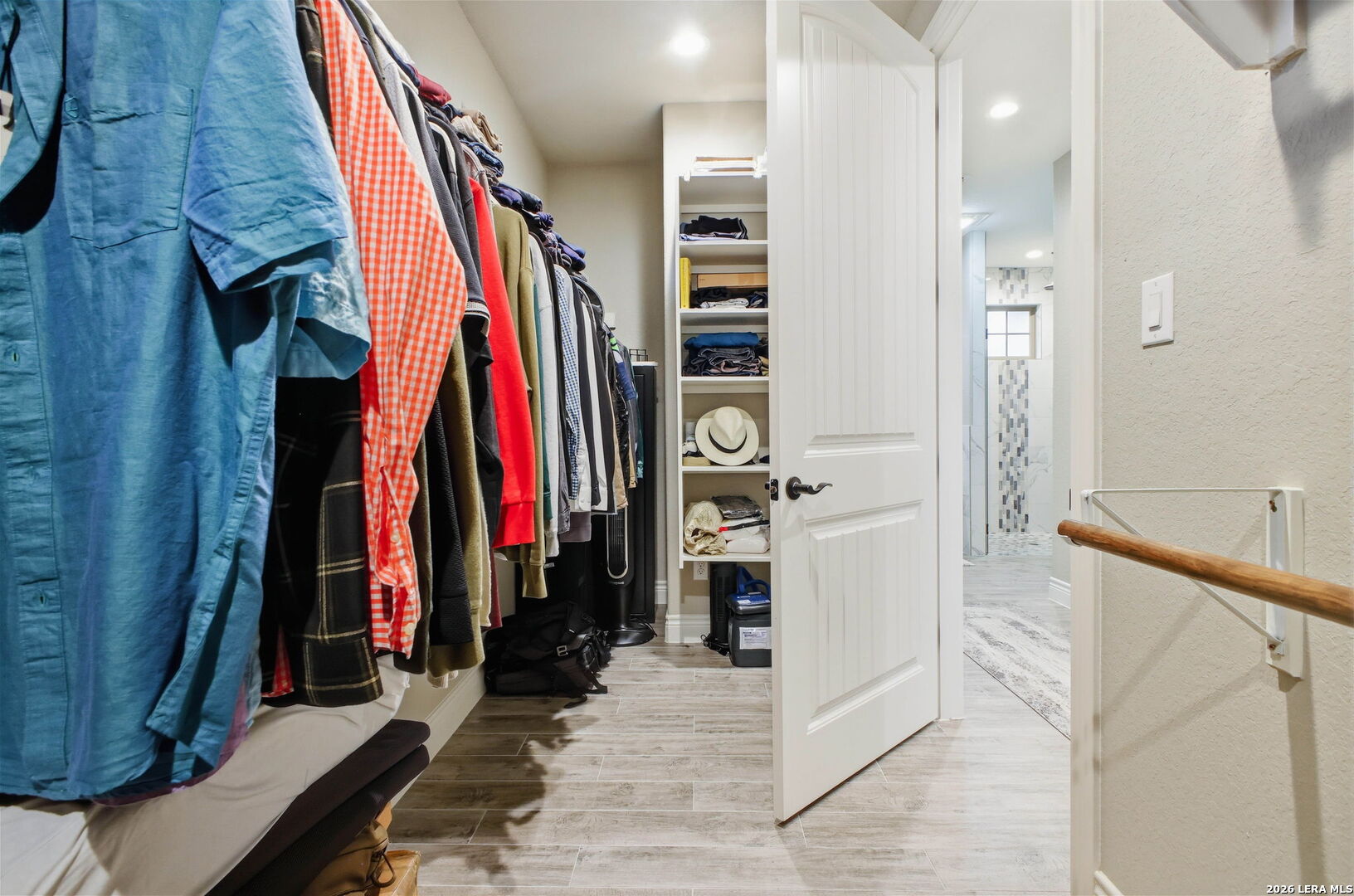 117 Crescent Ridge Adkins, TX 78101 - Photo 34 of 49 a view of walk in closet with clothes