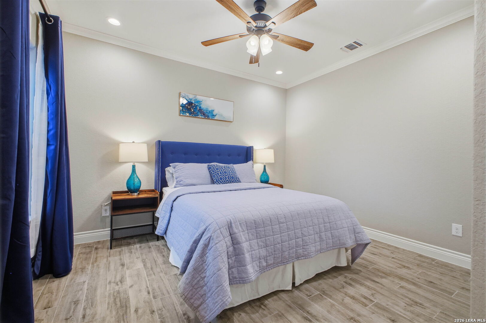 117 Crescent Ridge Adkins, TX 78101 - Photo 37 of 49 a bedroom with a bed and a chandelier