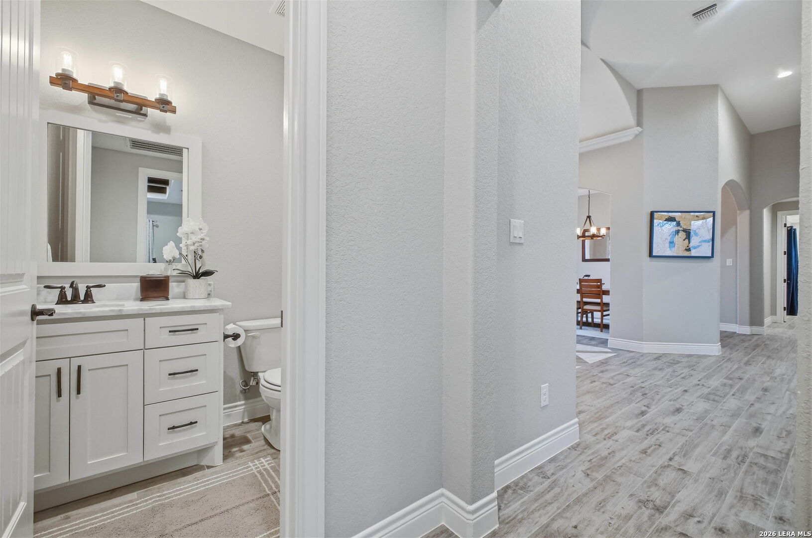 117 Crescent Ridge Adkins, TX 78101 - Photo 38 of 49 a bathroom with a sink vanity and mirror