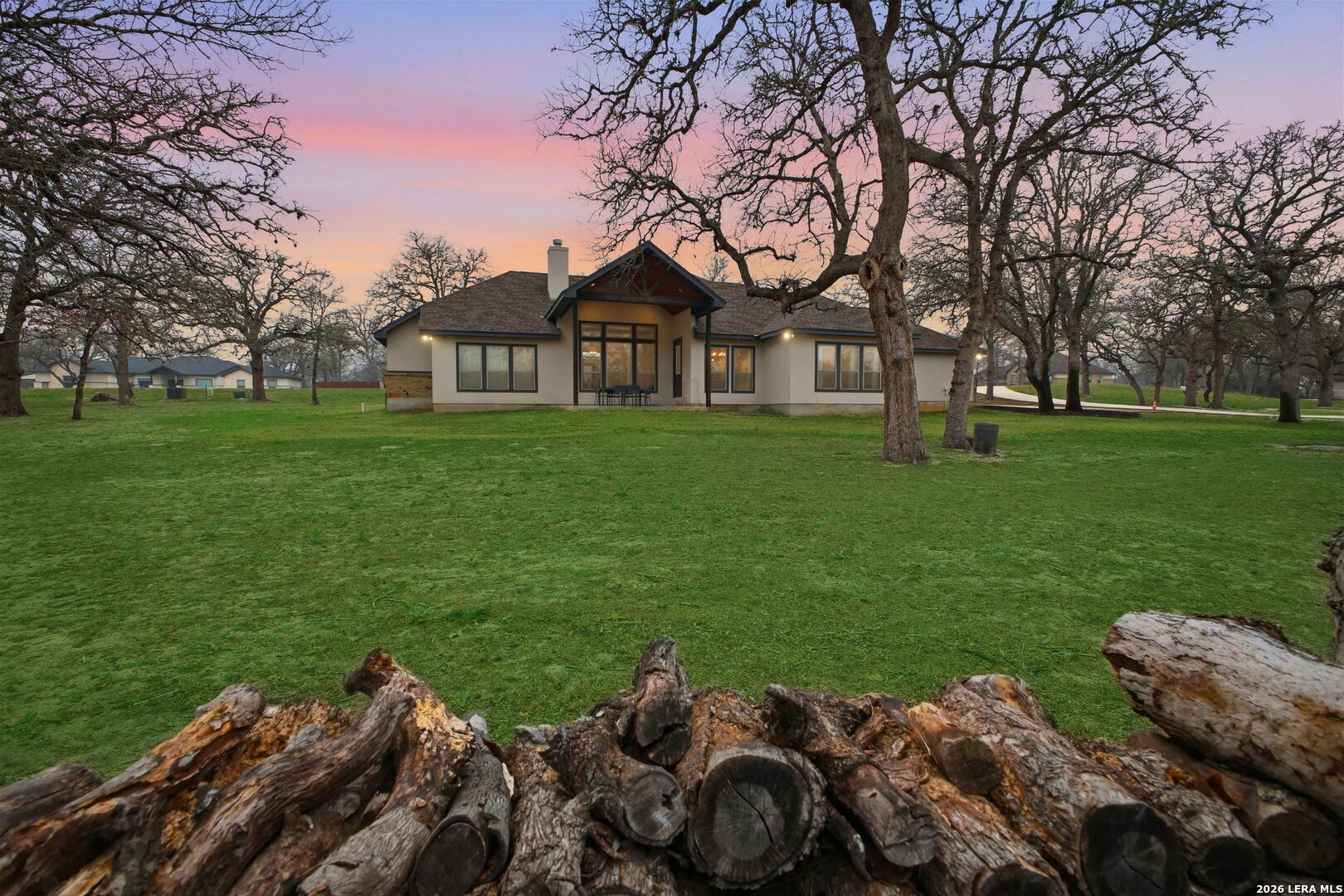 117 Crescent Ridge Adkins, TX 78101 - Photo 45 of 49 a backyard of a house with table and chairs