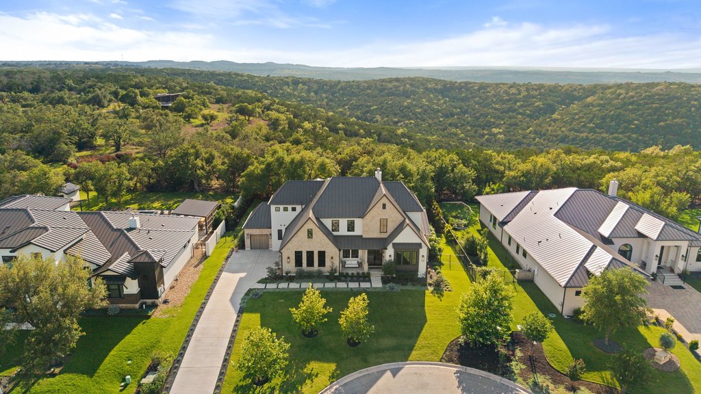 7516 Davenport Divide Road Austin, TX 78738 - Photo 4 of 40 Set at a cul-de-sac at the top of Davenport Divide, this home offers unparalleled luxury.