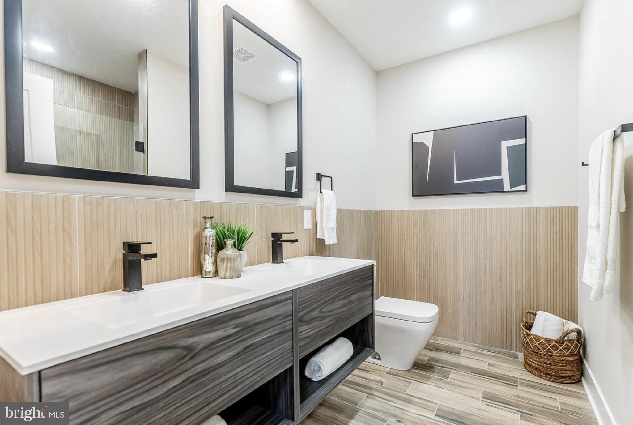 3223-29 Mercer Street Philadelphia, PA 19134 - Photo 15 of 25 a bathroom with a sink and a mirror