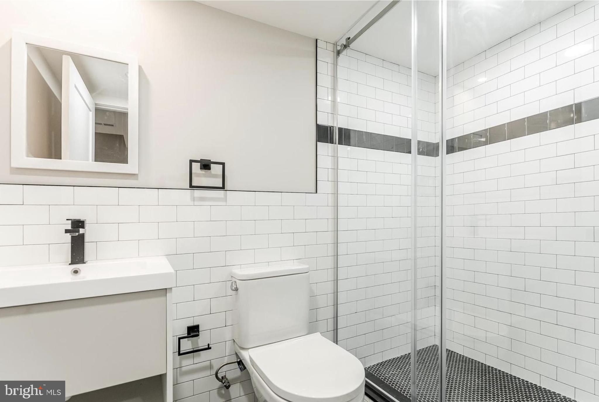 3223-29 Mercer Street Philadelphia, PA 19134 - Photo 24 of 25 a bathroom with a toilet sink and shower