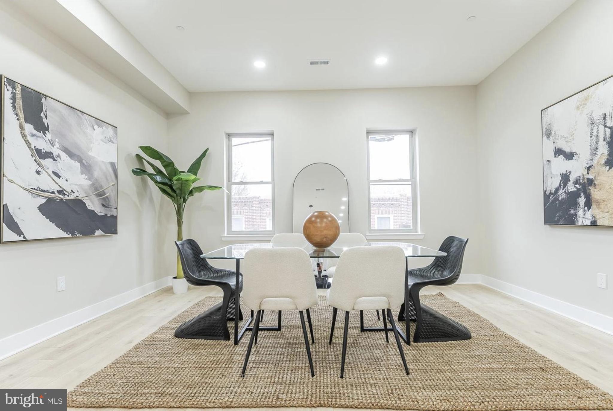3223-29 Mercer Street Philadelphia, PA 19134 - Photo 8 of 25 a view of a dining room with furniture and wooden floor