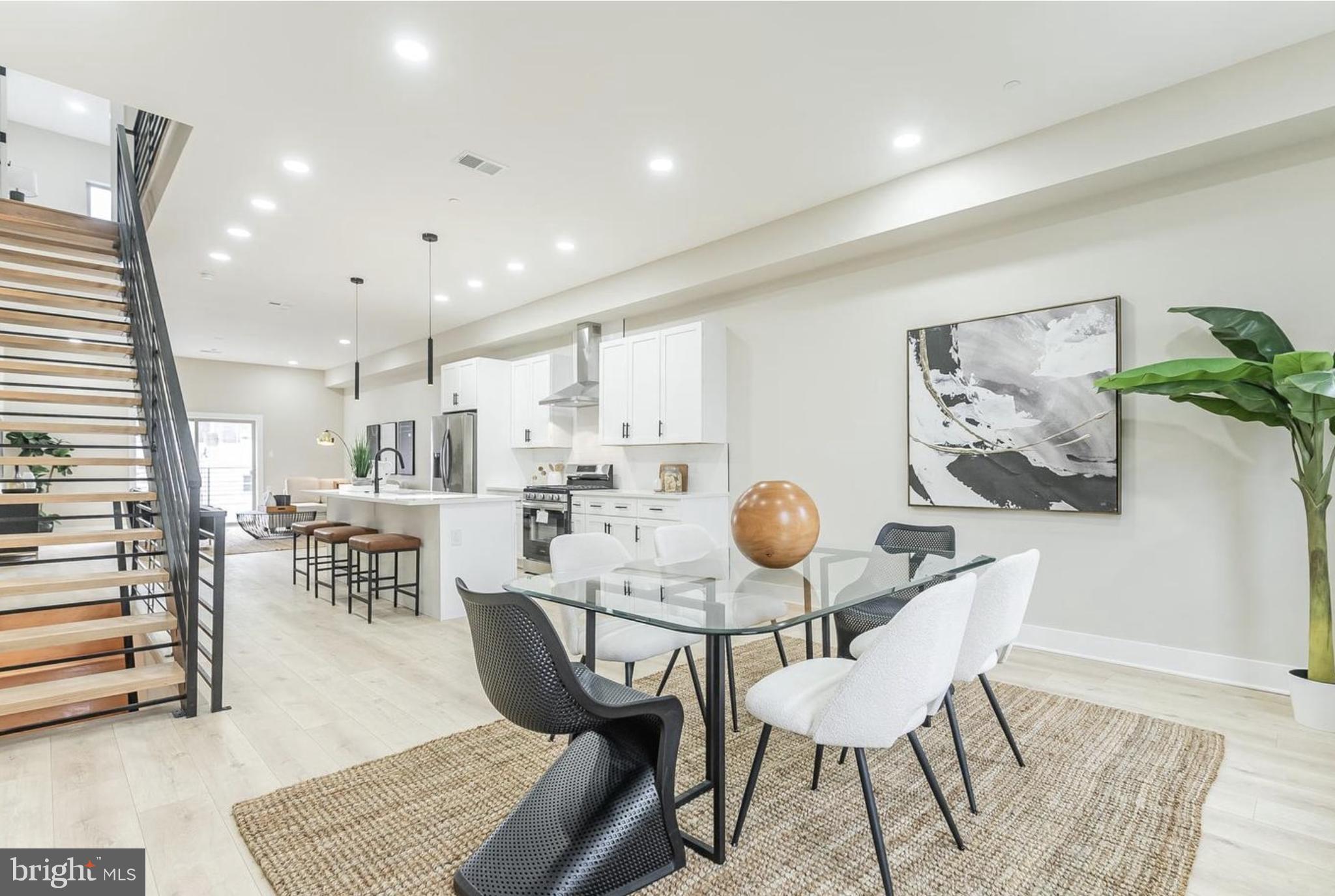 3223-29 Mercer Street Philadelphia, PA 19134 - Photo 9 of 25 a view of a dining room with furniture and wooden floor