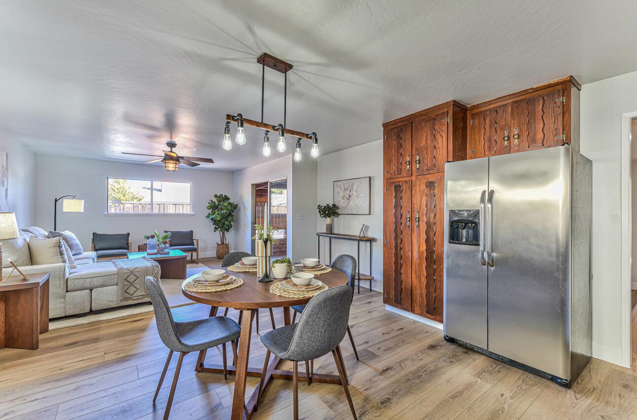 242 Howes Drive Los Gatos, CA 95032 - Photo 14 of 37 a view of a dining room with furniture window and wooden floor