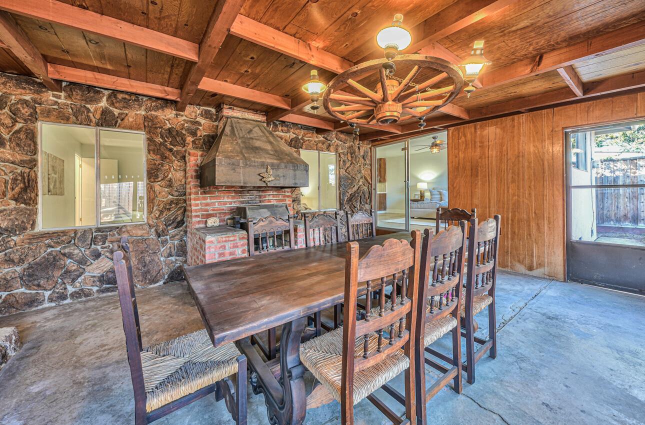242 Howes Drive Los Gatos, CA 95032 - Photo 17 of 37 a view of a dining room with furniture window and wooden floor