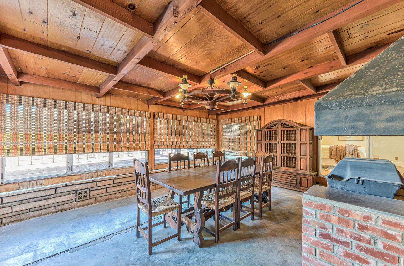 242 Howes Drive Los Gatos, CA 95032 - Photo 18 of 37 a dining room with furniture and wooden floor