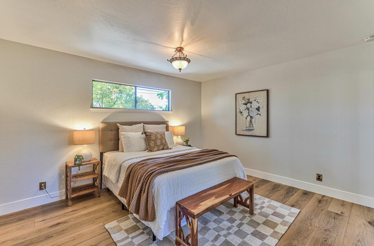242 Howes Drive Los Gatos, CA 95032 - Photo 20 of 37 a bedroom with bed and a window