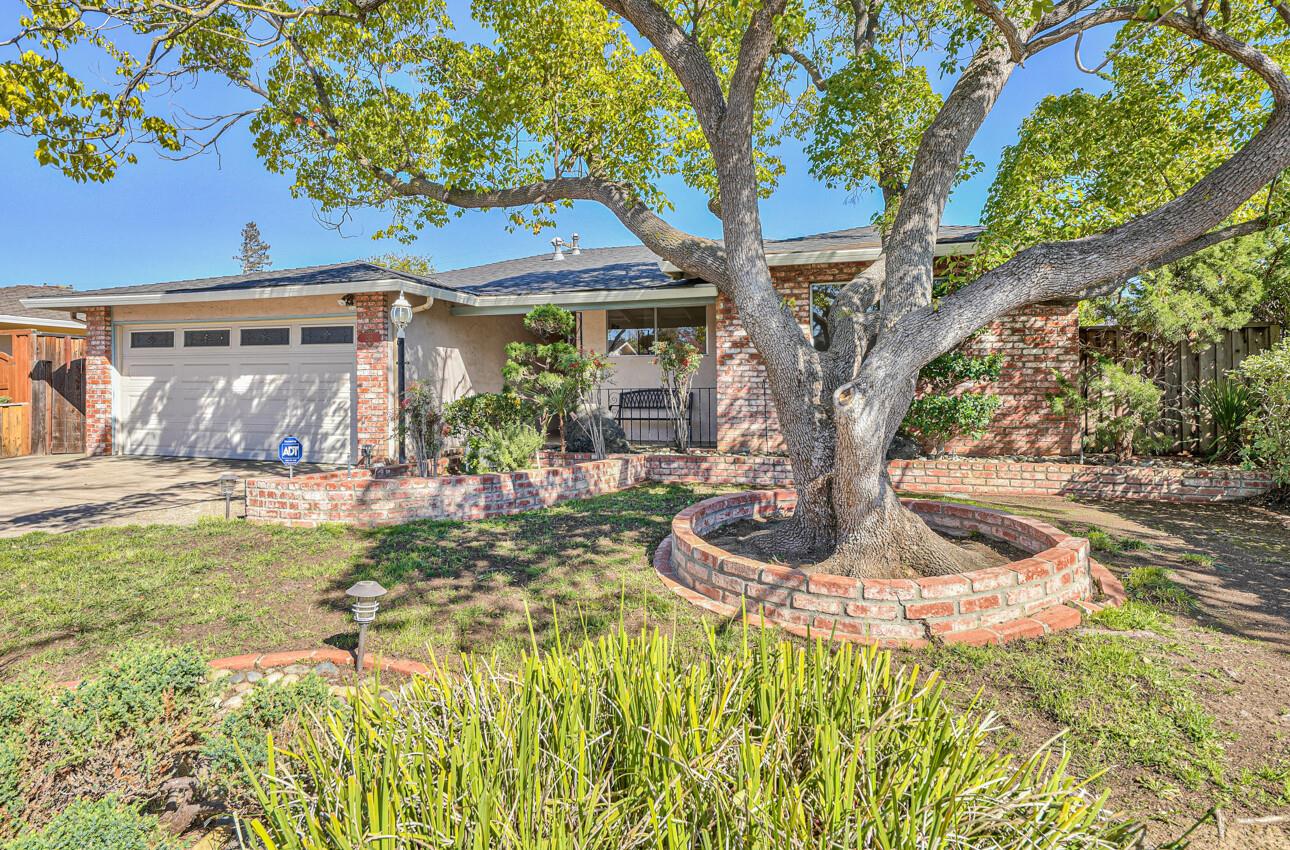 242 Howes Drive Los Gatos, CA 95032 - Photo 2 of 37 a front view of a house with a yard